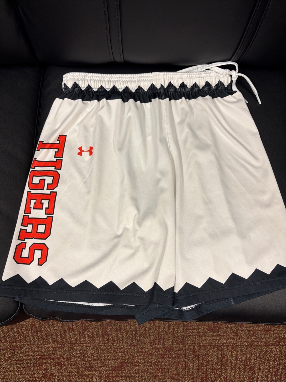 Under Armour White Basketball Shorts with Black Trim and Orange Lettering TIGERS